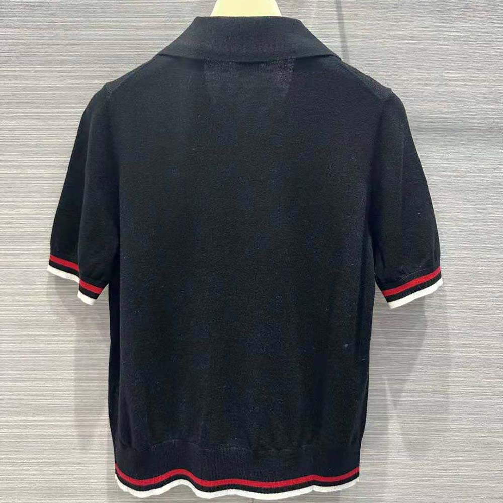 Side profile highlighting cropped fit of Miu Miu Women Polo Shirt-Navy