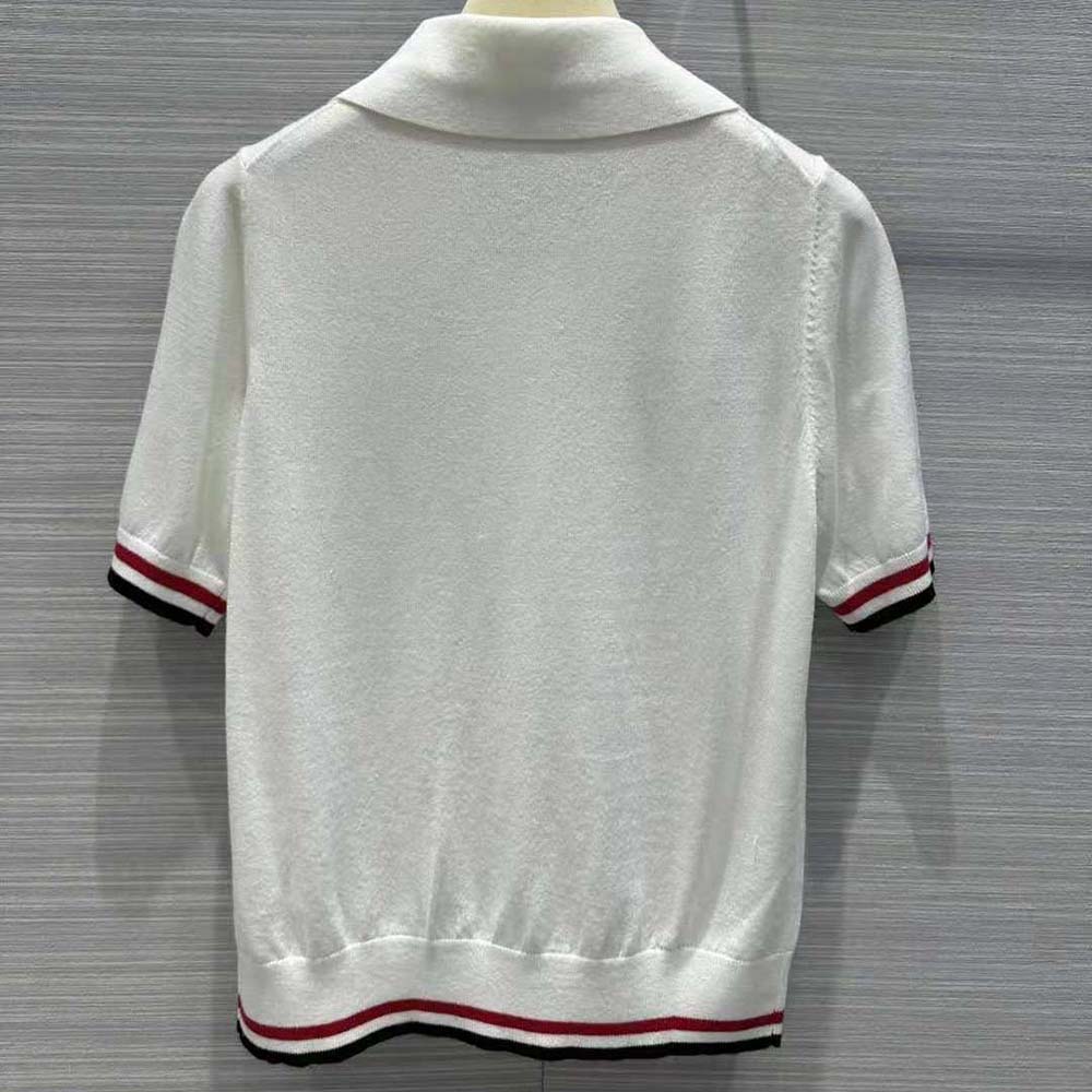 Side profile showing silhouette of Miu Miu Cropped Silk and Cotton Polo Shirt