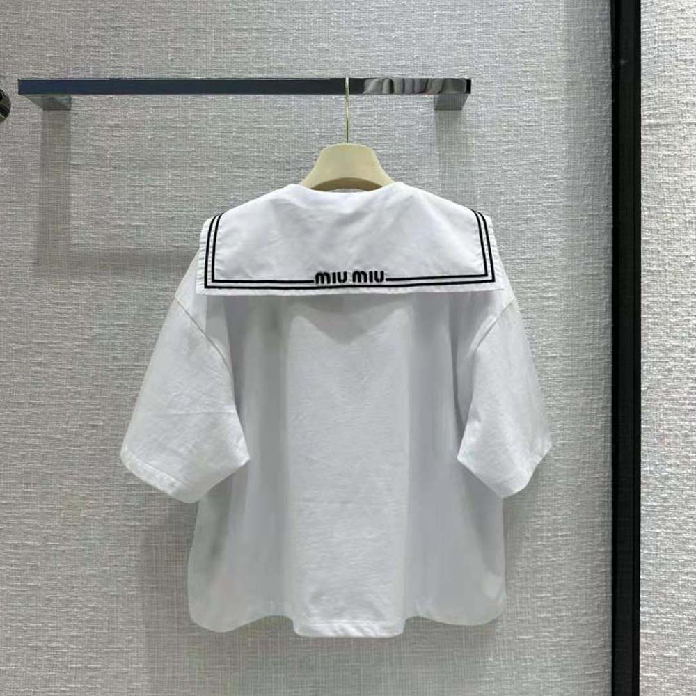 Side angle showing relaxed fit of Miu Miu Women Embroidered Cotton T-shirt