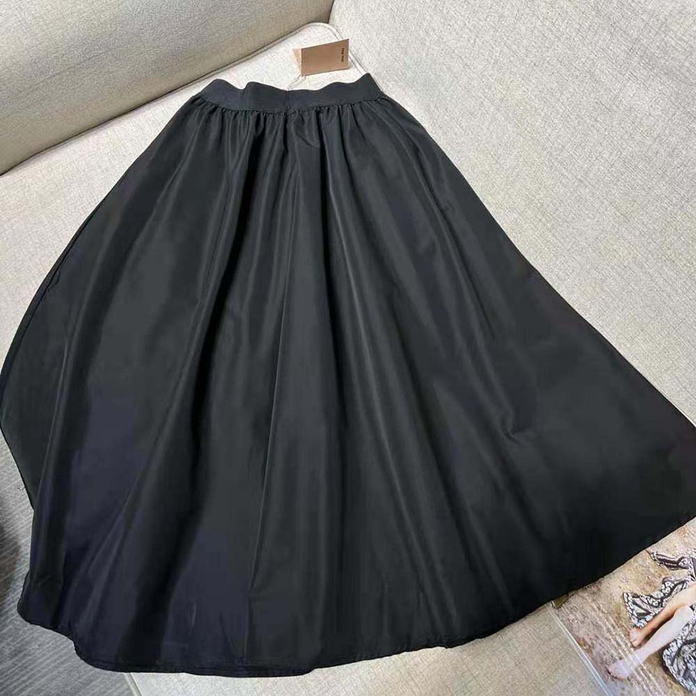 Side angle showing flowing silhouette of Miu Miu Women Full Technical Silk Skirt