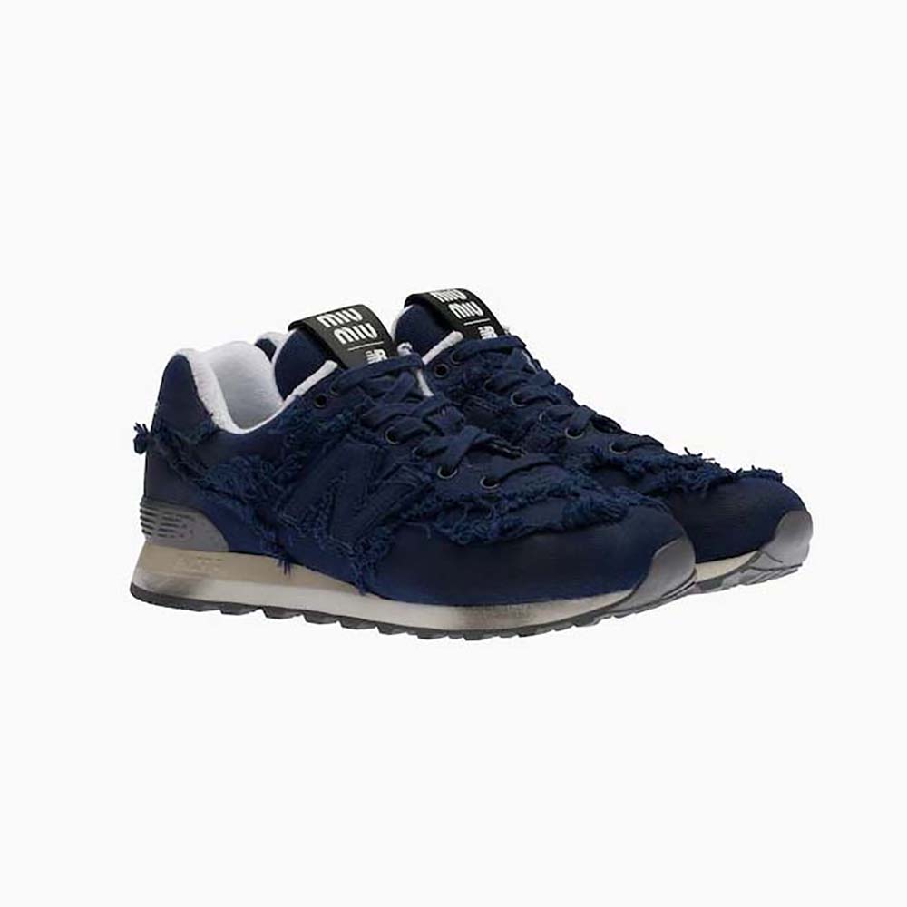 Side view of Miu Miu Women New Balance 574 x Miu Miu Denim Sneakers-Navy