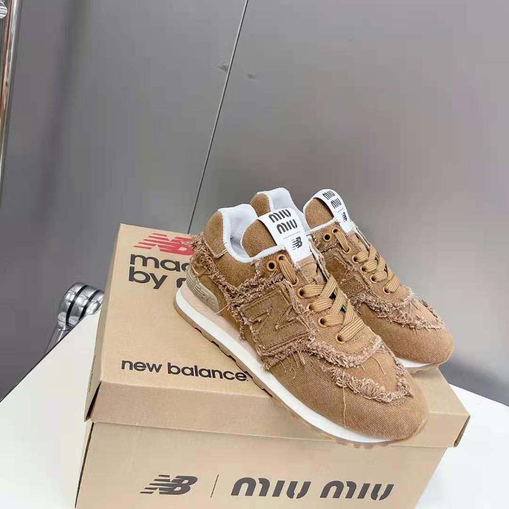 Top view showing lace details and signature logo on Miu Miu Brown sneakers