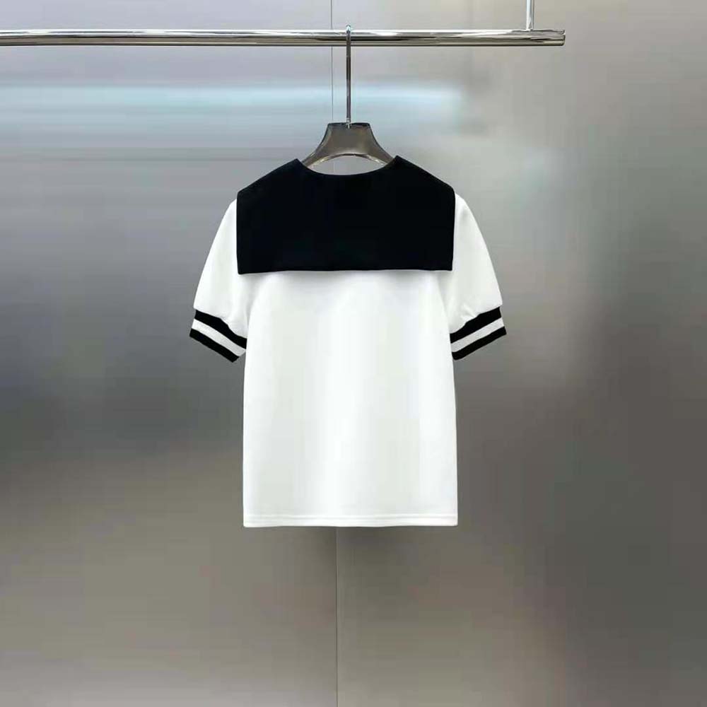 Side profile of white Miu Miu Women Piqué Top highlighting piqué texture