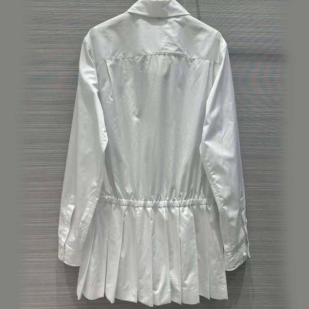 Side angle showing flared silhouette of Miu Miu Women Poplin Mini-Dress with Embroidered Logo