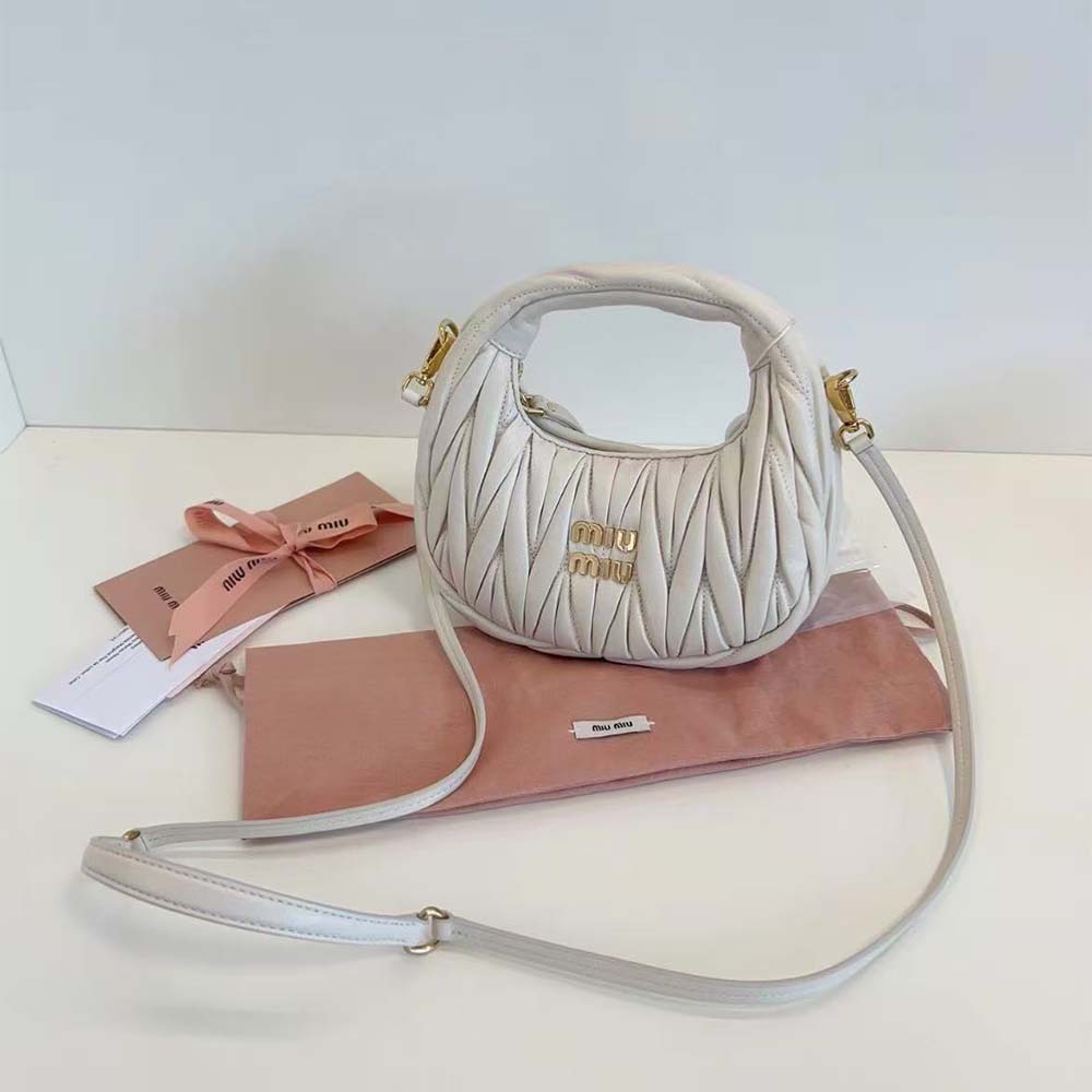 Side angle showing gold-tone hardware on Miu Miu Women Wander Nappa Leather Mini-Bag