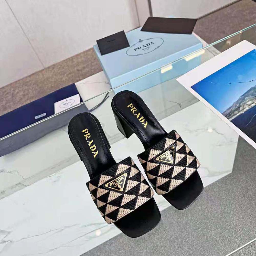 Close-up of buckle and signature hardware on Prada Women Embroidered Fabric Sandals-Black