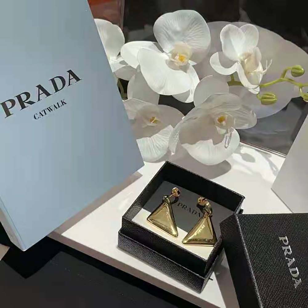 Close-up of butterfly closure on Prada Women Eternal Gold Medium Drop Earrings