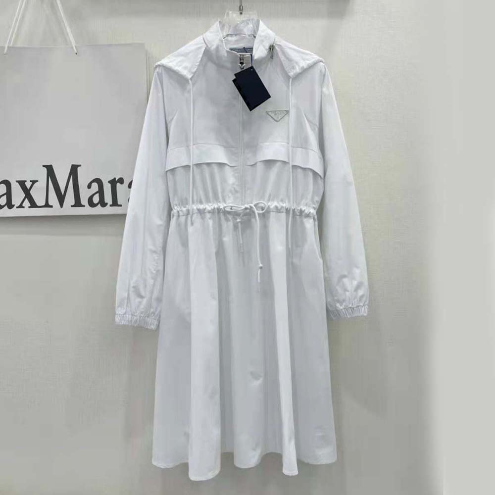 Close-up of embroidered triangle logo on Prada Women Hooded Poplin Dress