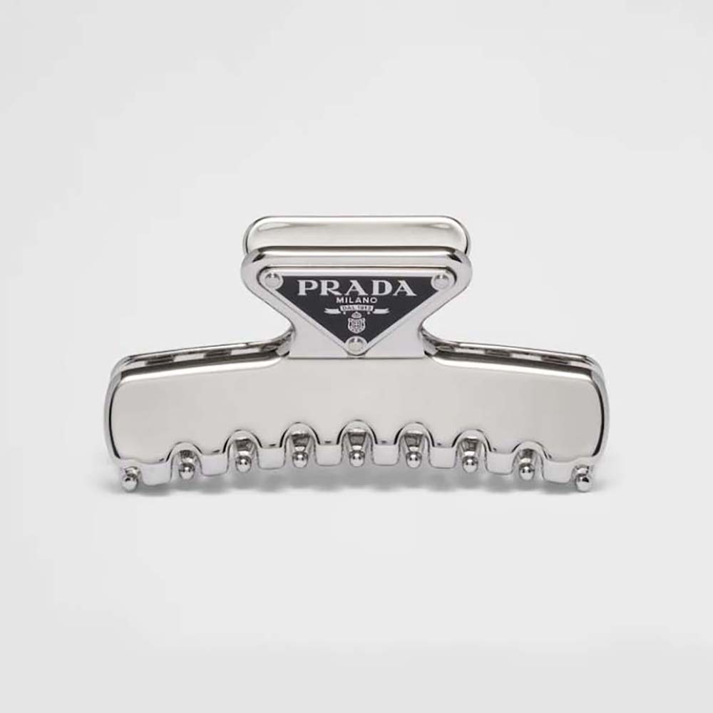 Close-up of Prada Women Metal Hair Clip polished silver detail
