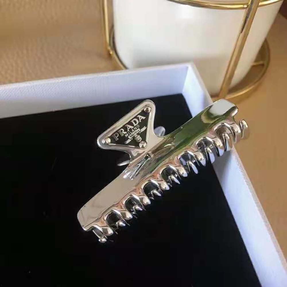 Prada Women Metal Hair Clip securing loose hair strands