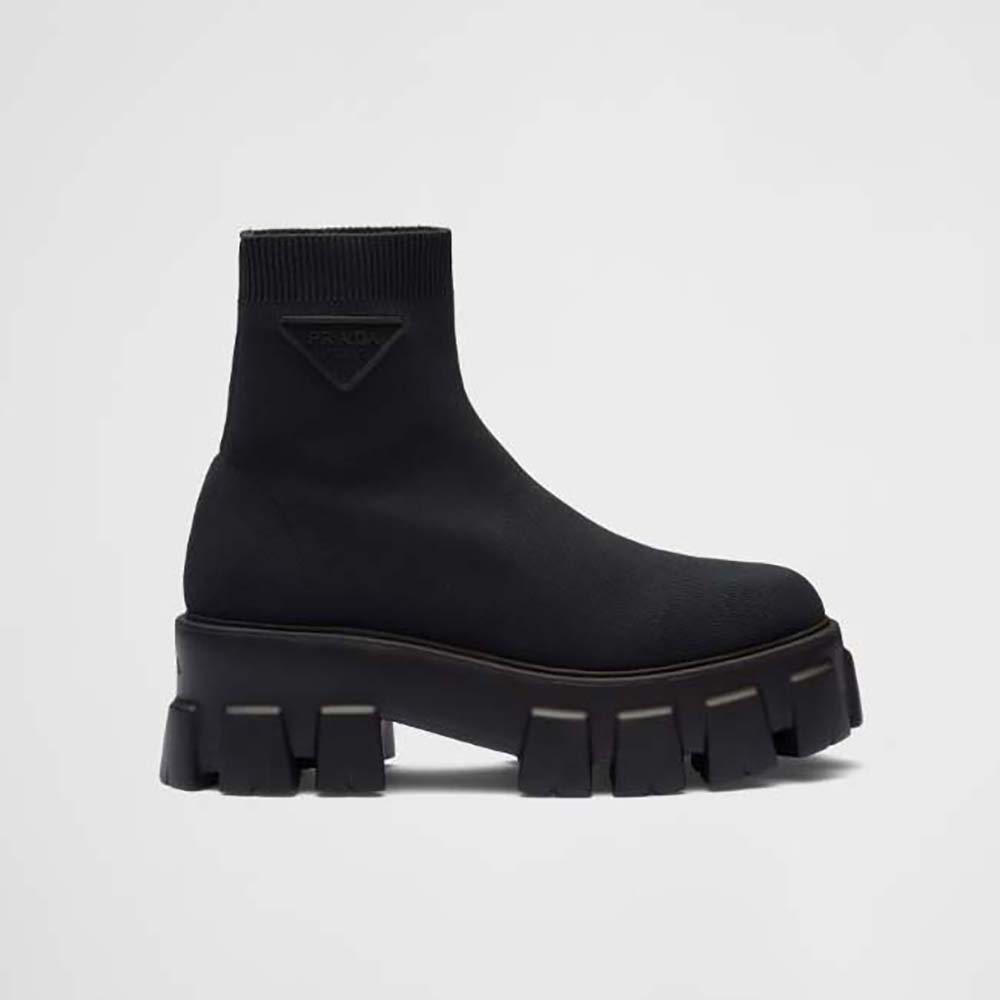 Side view of Prada Women Monolith Knit Booties with embossed rubber triangle logo