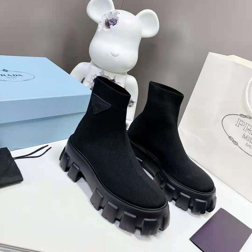 Front angle showing chunky monolith sole of Prada Women Monolith Knit Booties