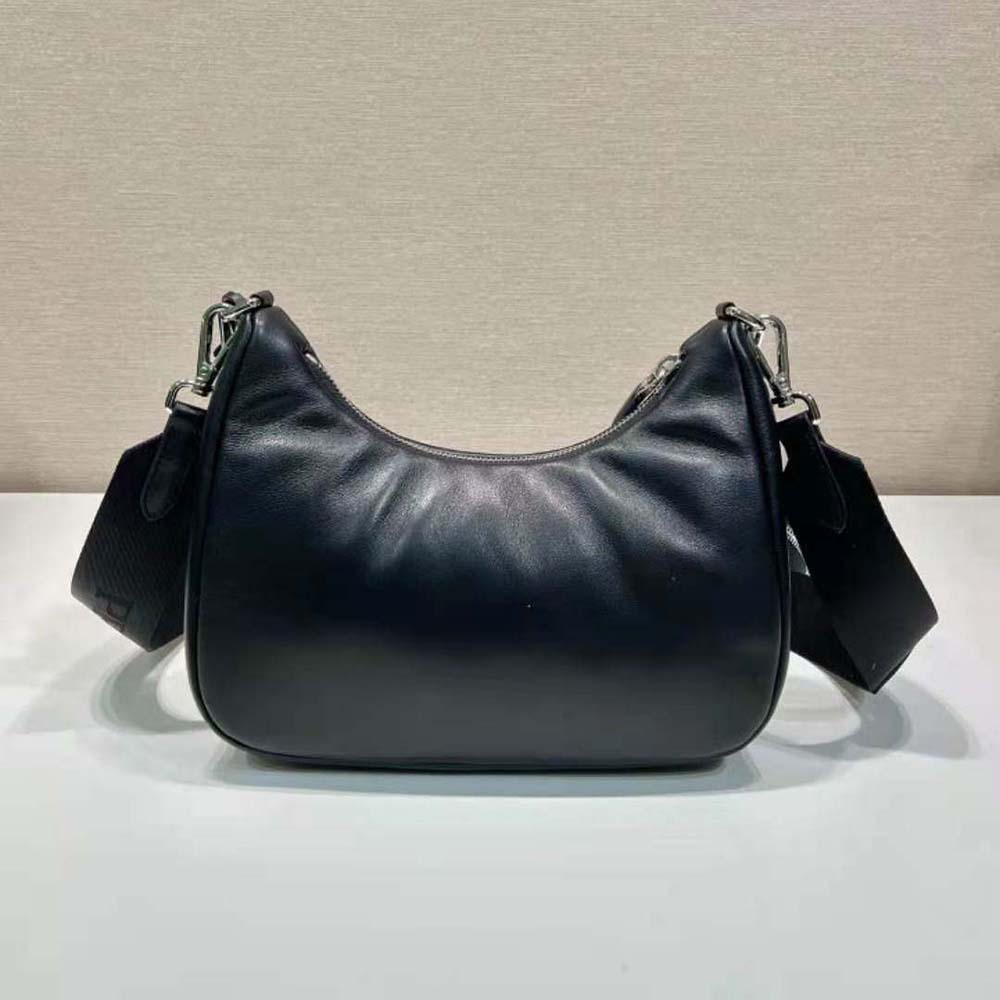 Side profile showing the adjustable strap on Prada Re-Edition 2005 shoulder bag