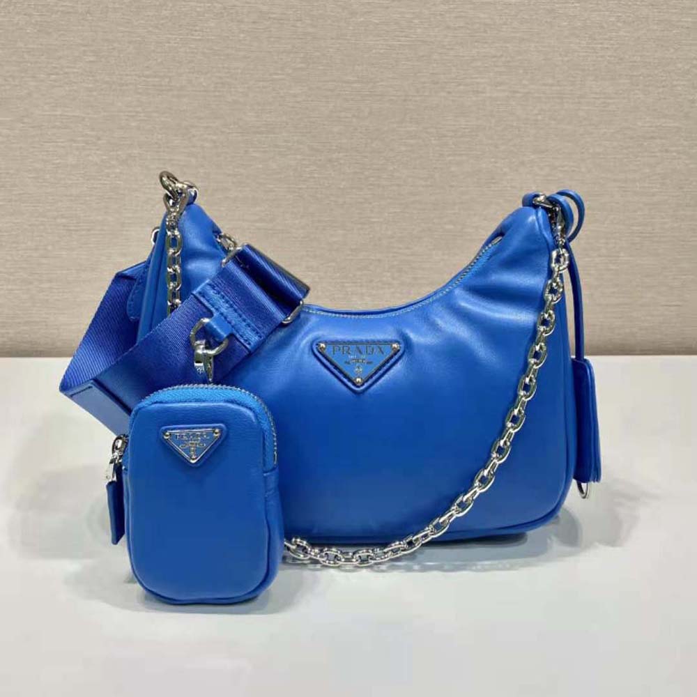 Close-up of quilted nappa leather and silver Prada logo detail on bag