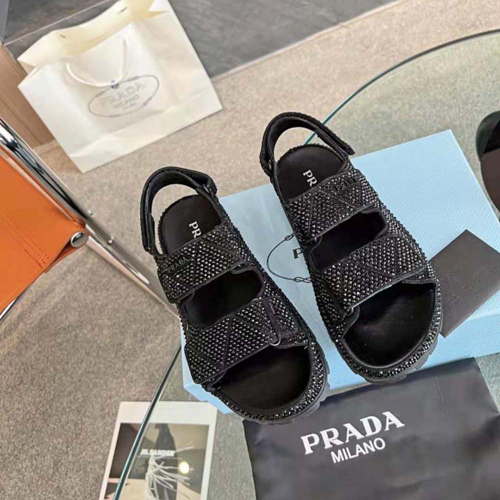 Close-up of crystal-embellished straps on Prada Women Satin Sandals