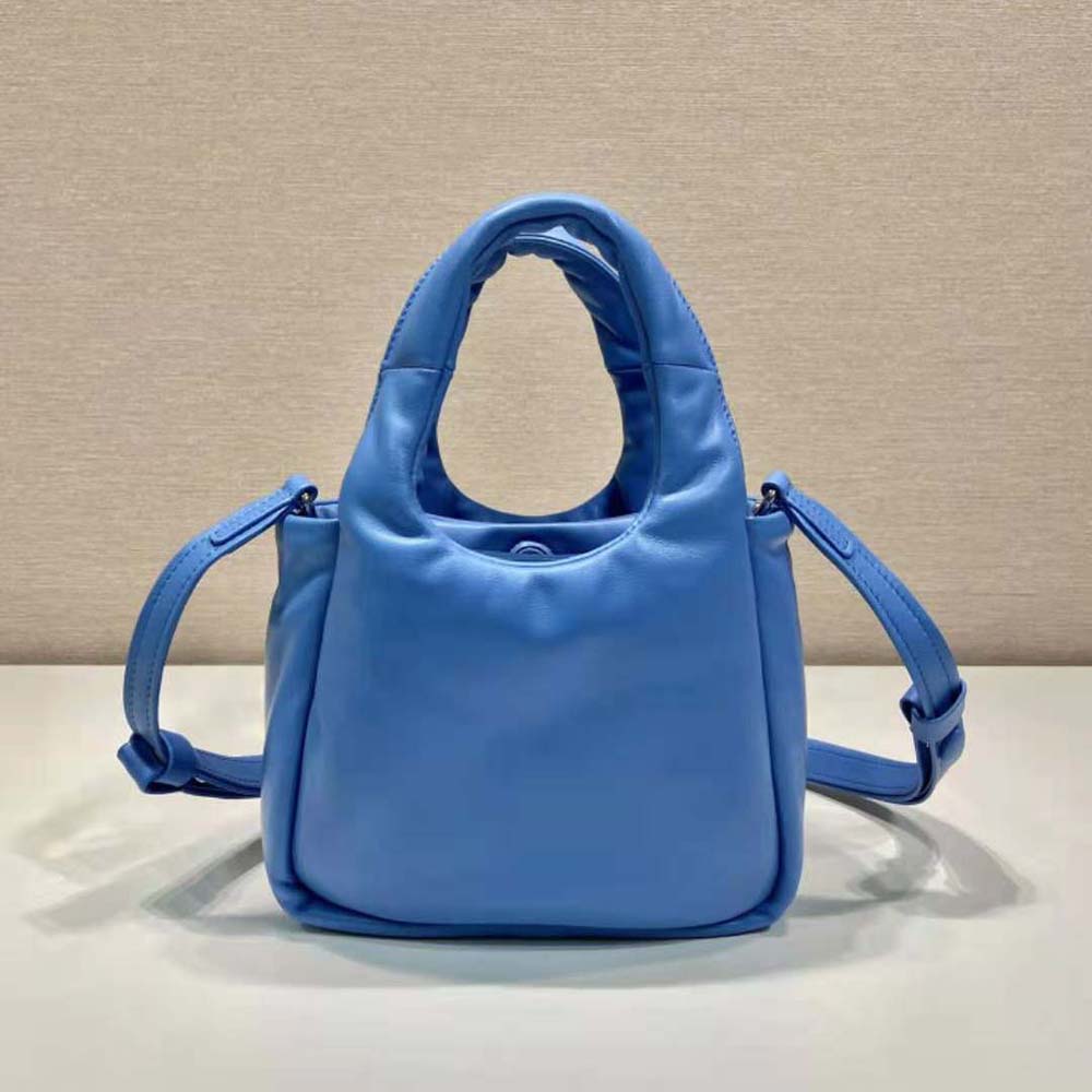 Side view showing compact silhouette of Prada Women Small Padded Nappa-Leather Bag