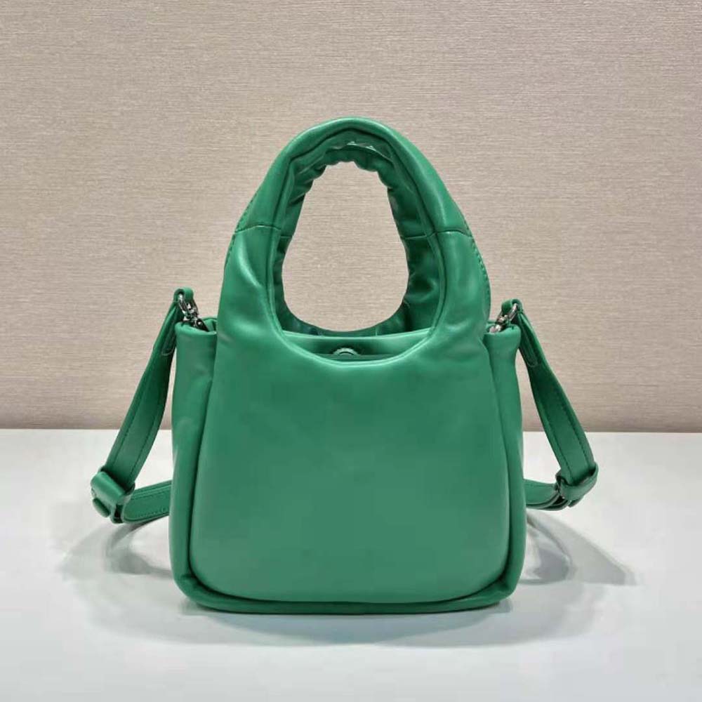 Detail of gold-tone hardware and zipper on Prada Women Small Padded Bag Green