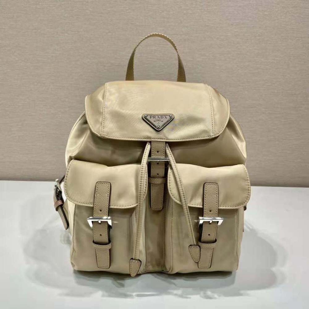 Close-up of silver-tone hardware on Prada Women Small Re-Nylon Backpack-Beige