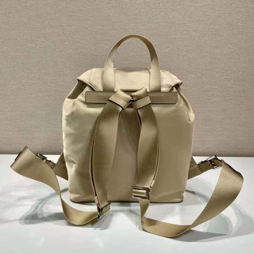 Side profile showing adjustable straps on Prada Women Small Re-Nylon Backpack-Beige