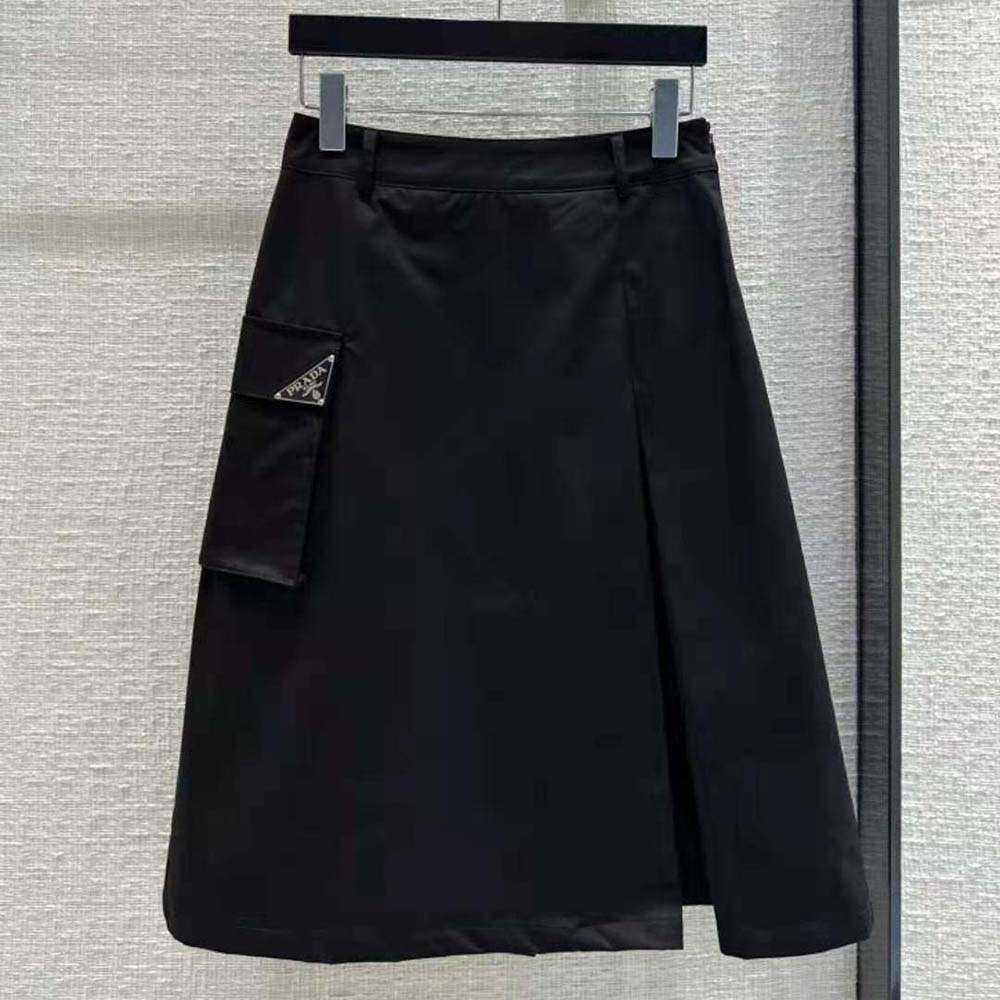 Close-up of technical canvas fabric and branded hardware detail