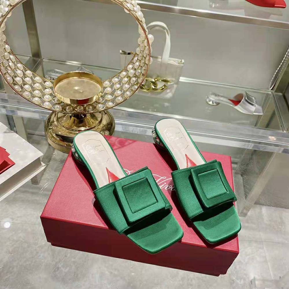 Top angle showing green satin and slip-on silhouette of Roger Vivier mules