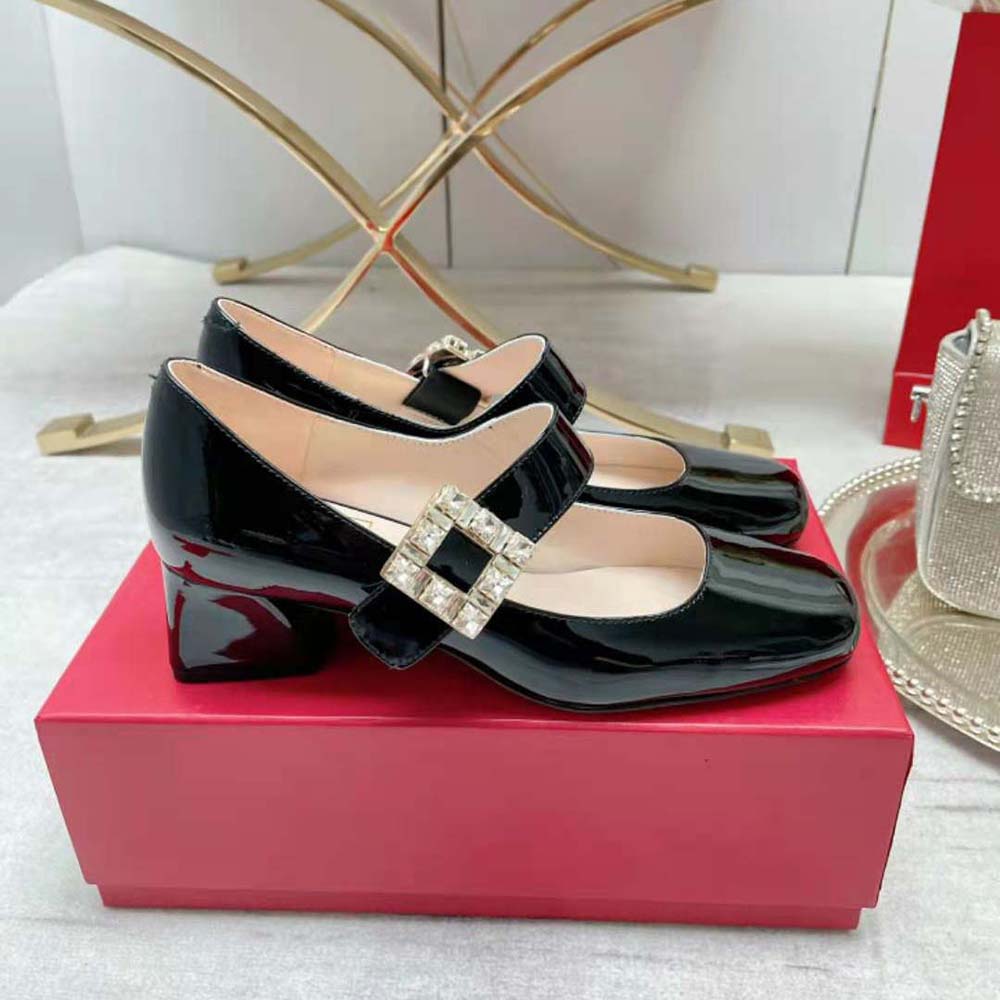 Top view showing smooth black leather and buckle on Roger Vivier babies pumps