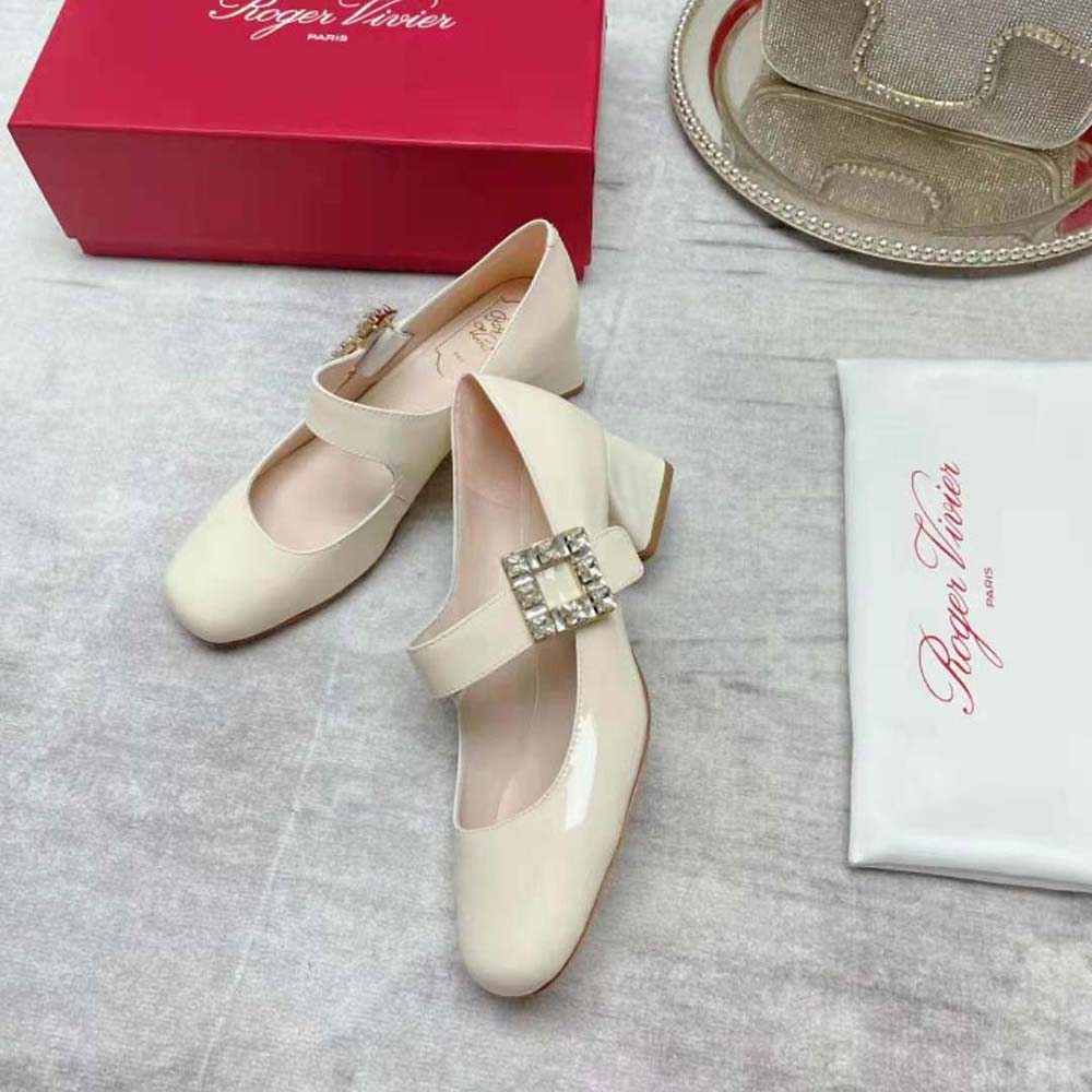 Top angle showing white leather and sleek silhouette of Roger Vivier Babies Pumps