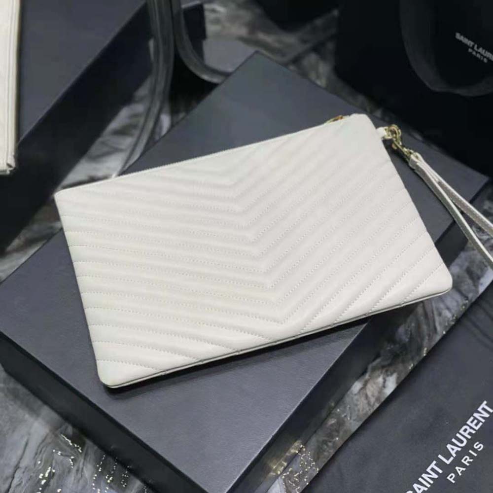 Side angle showing slim silhouette of Saint Laurent Cassandre Matelassé Tablet Pouch