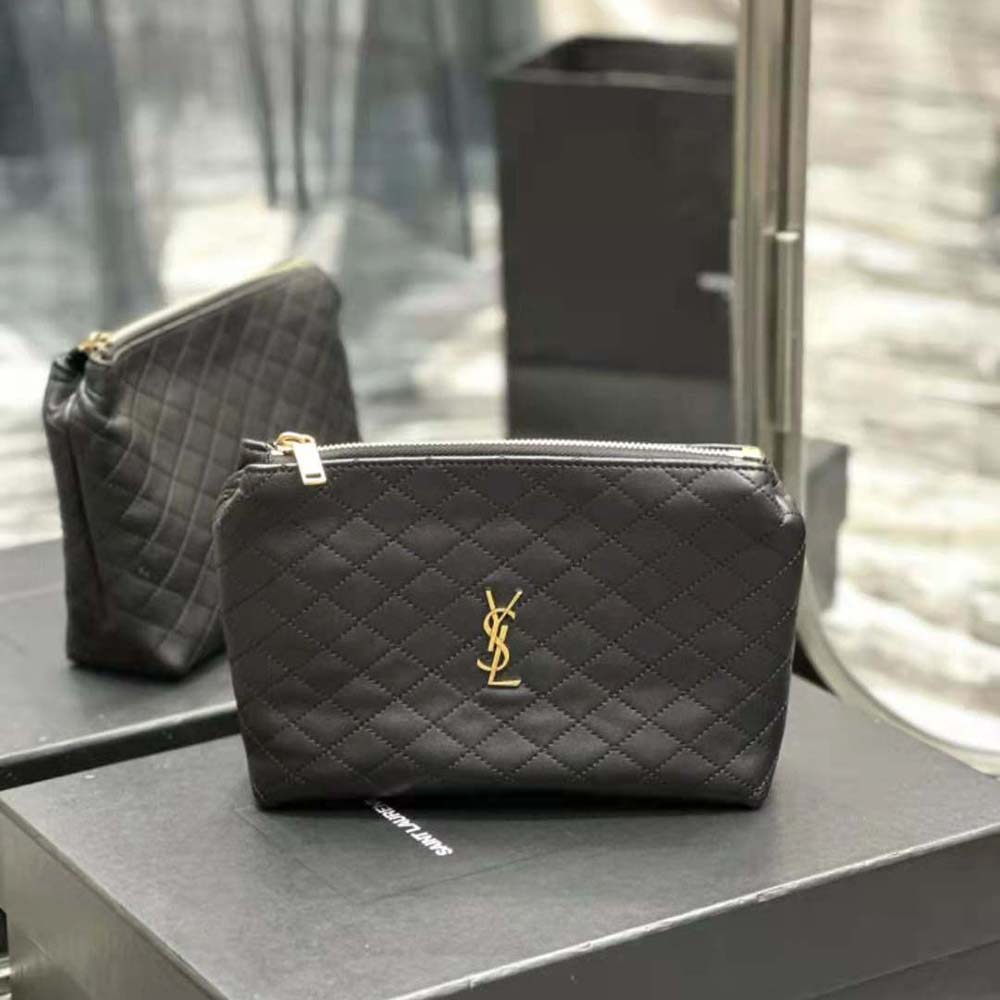Close-up on gold YSL logo hardware and chevron quilting detail
