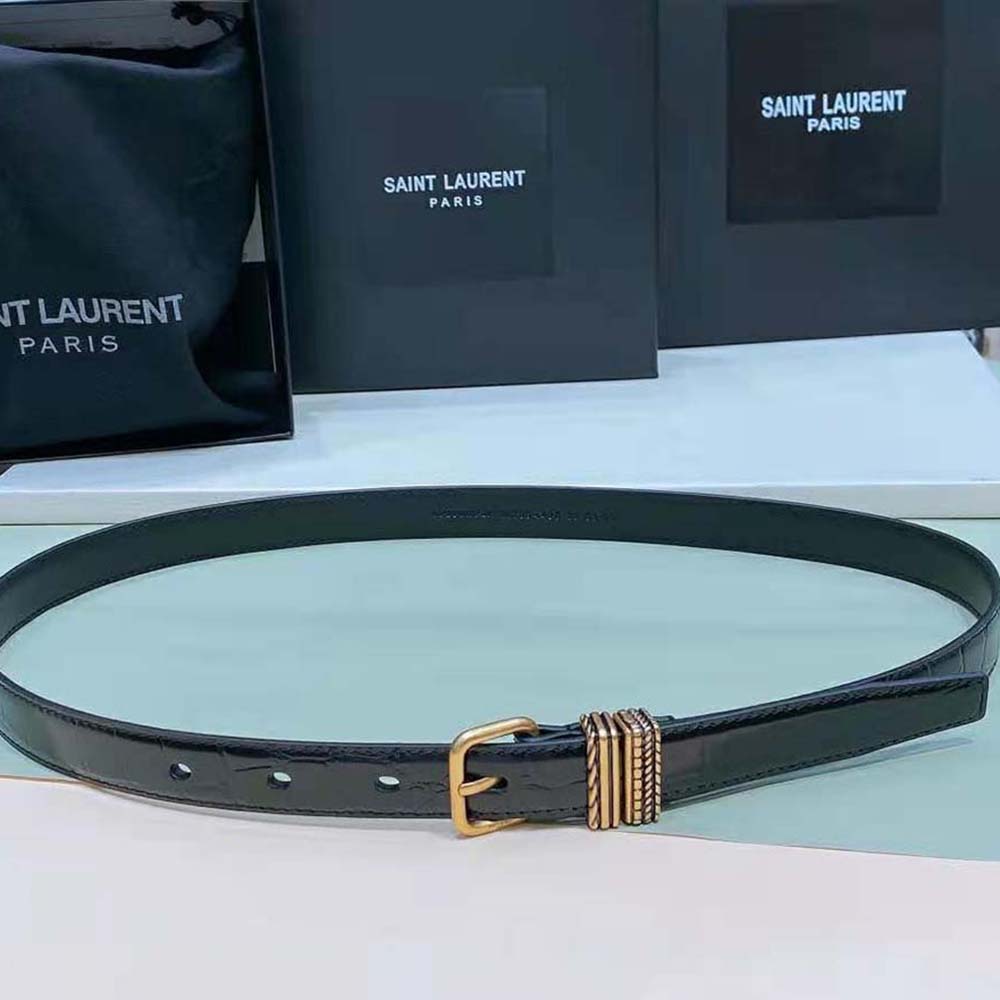 Close-up of gold YSL buckle on Saint Laurent YSL Women Hublot Loop Belt