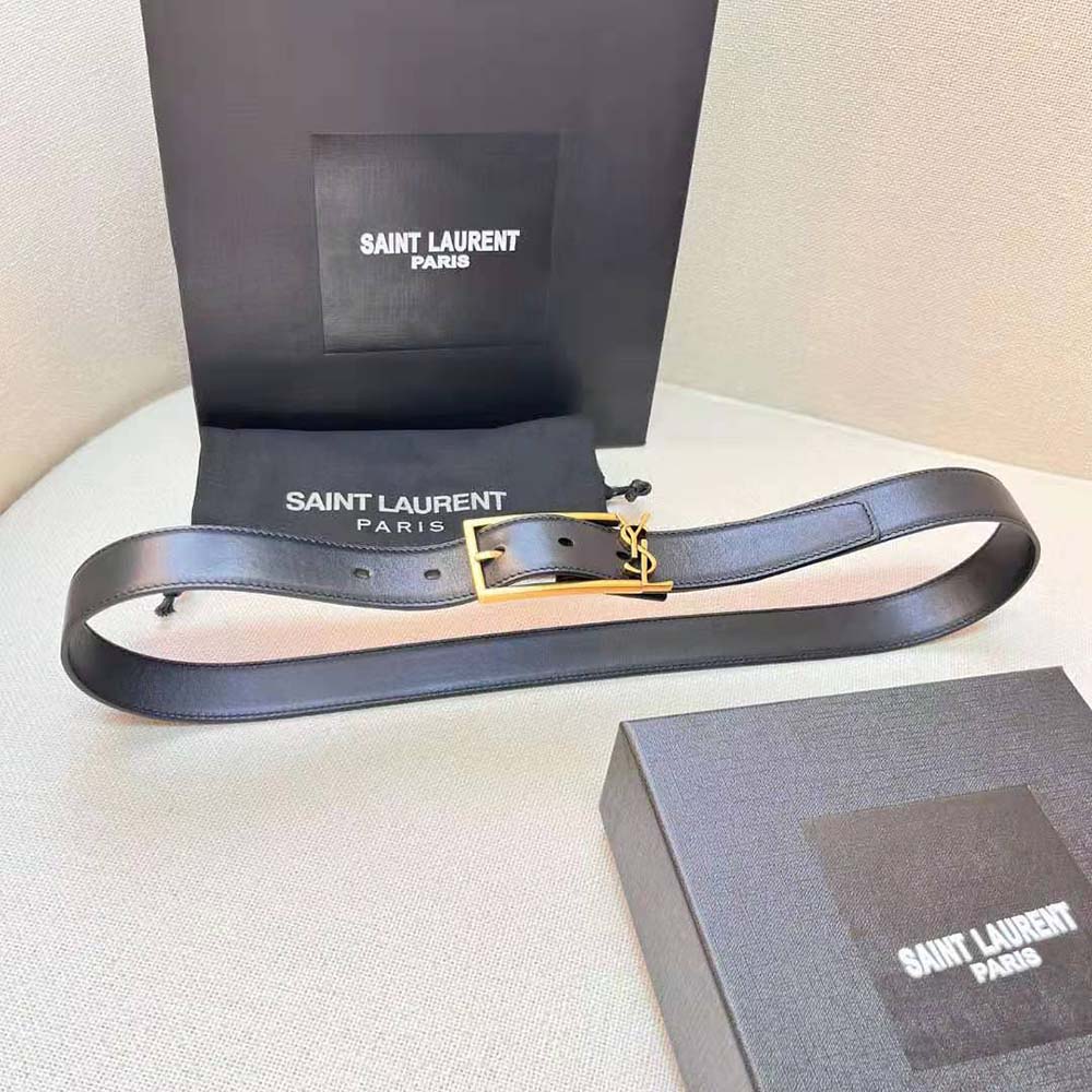 Close-up of polished Cassandre buckle on Saint Laurent YSL women’s belt