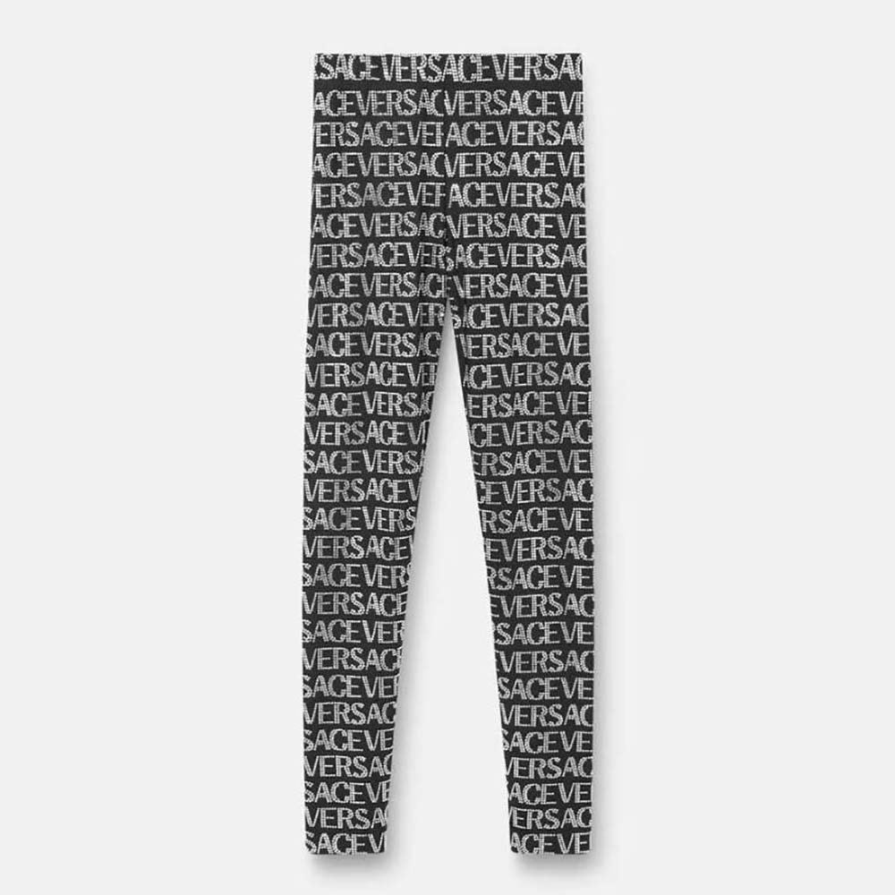 Front view of Versace Women Crystal Versace Allover Leggings in black