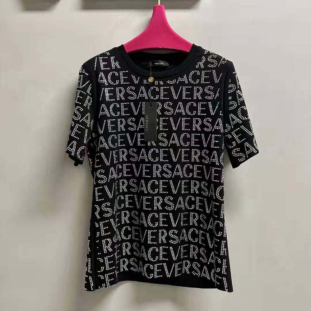 Close-up of crystal logo detail on Versace Women Crystal Versace Allover T-shirt