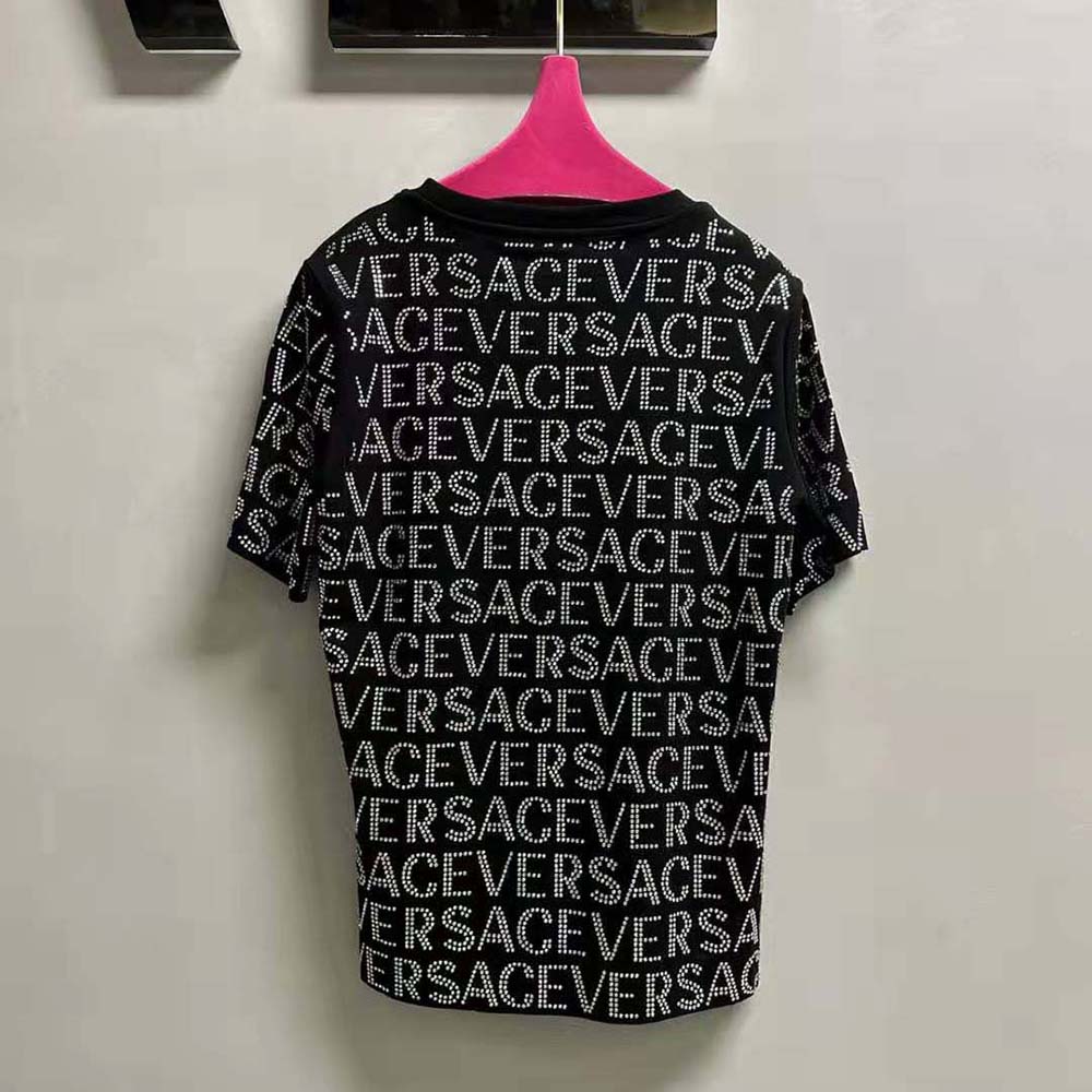Side angle showcasing silhouette of Versace Women Crystal Versace Allover T-shirt