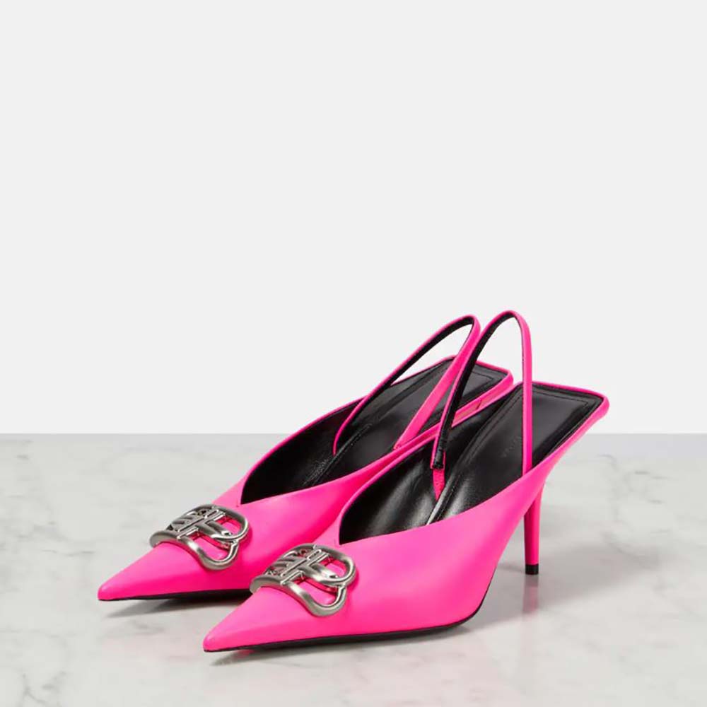 Close-up of polished silver BB logo on pink slingback mule