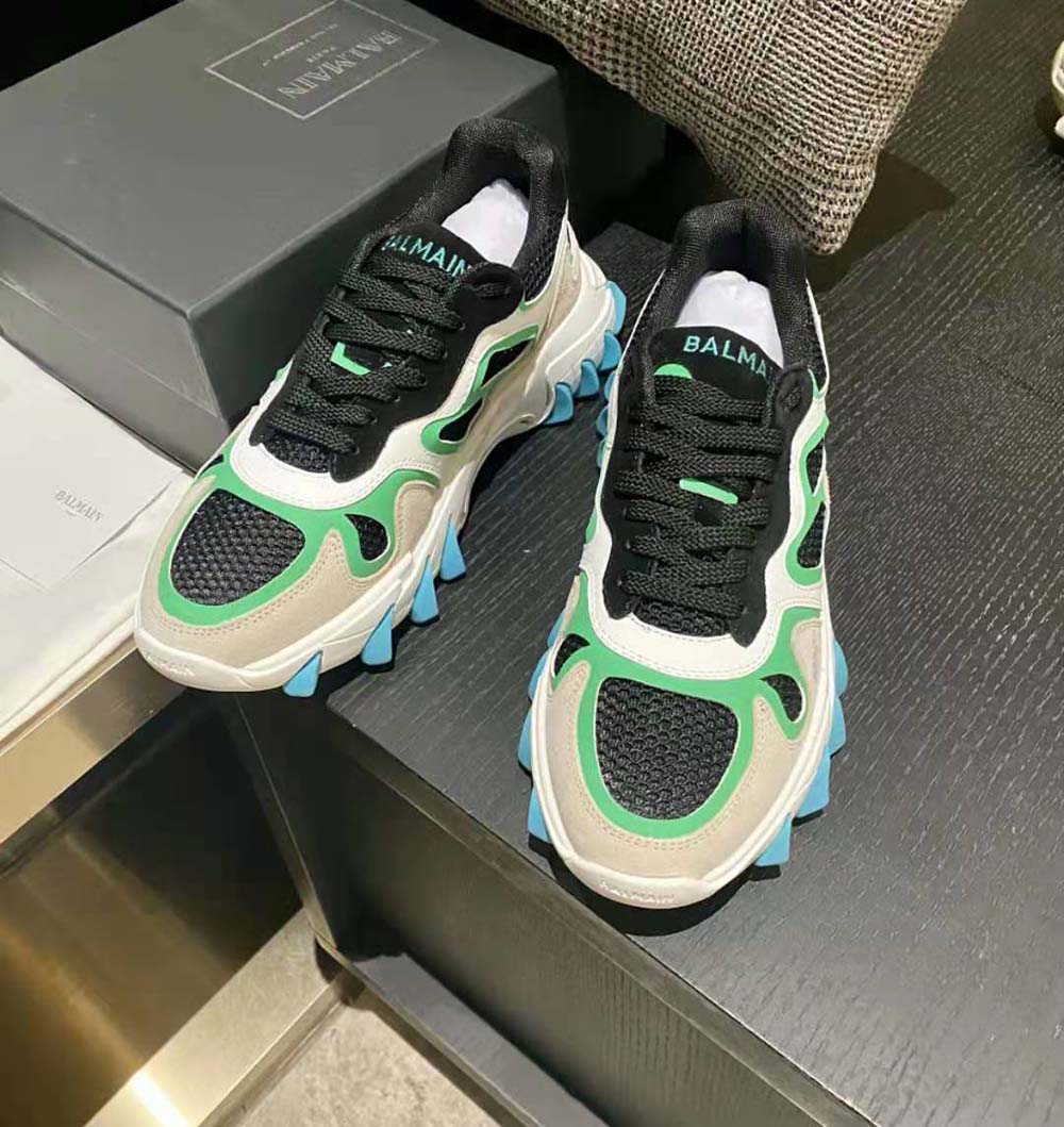 Overhead view showing aqua mesh and suede details on Balmain B-East Trainer