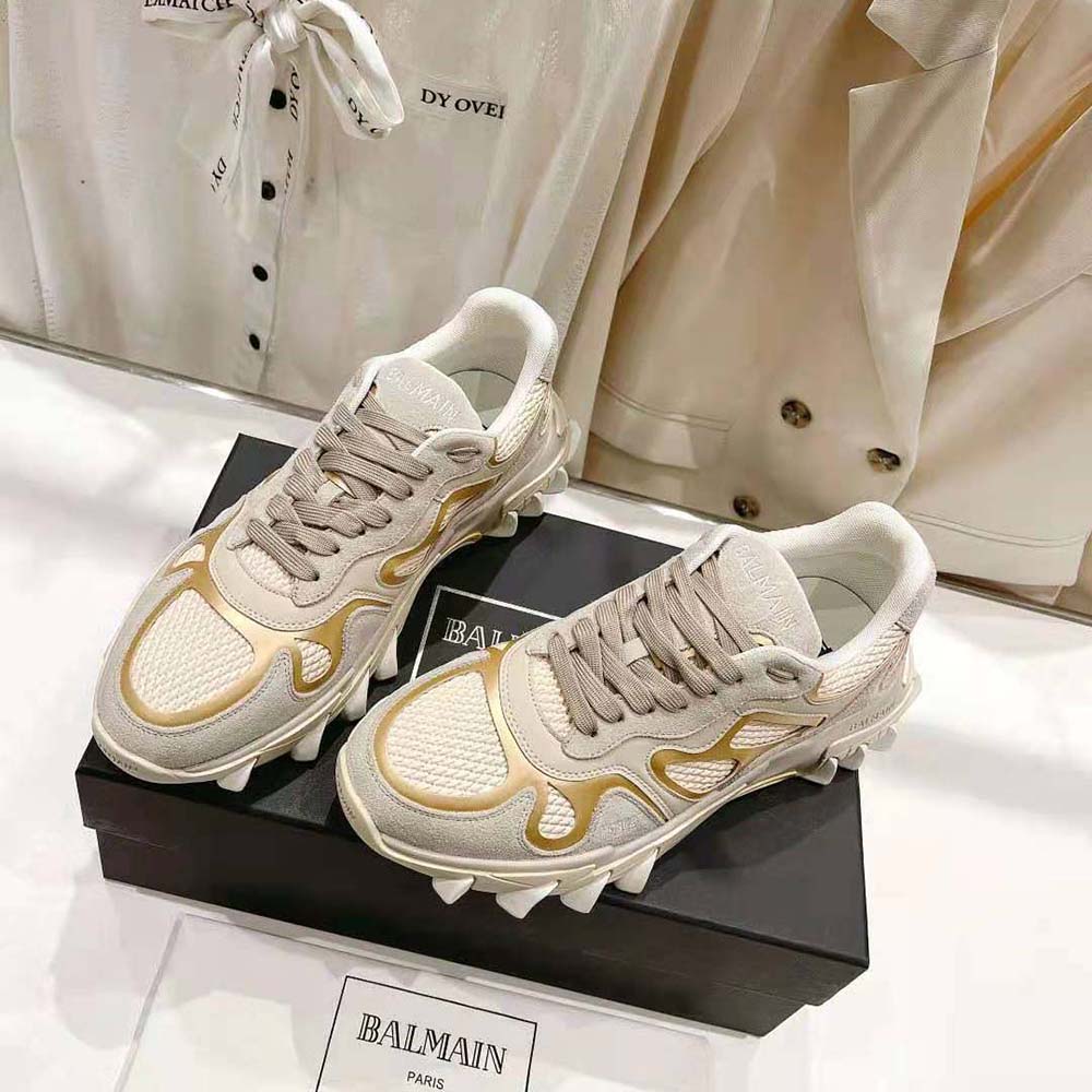 Close-up of mesh upper and Balmain logo hardware on B-East Trainer