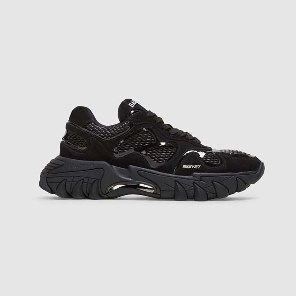 Side profile of Balmain Unisex B-East Trainer in Black leather suede mesh