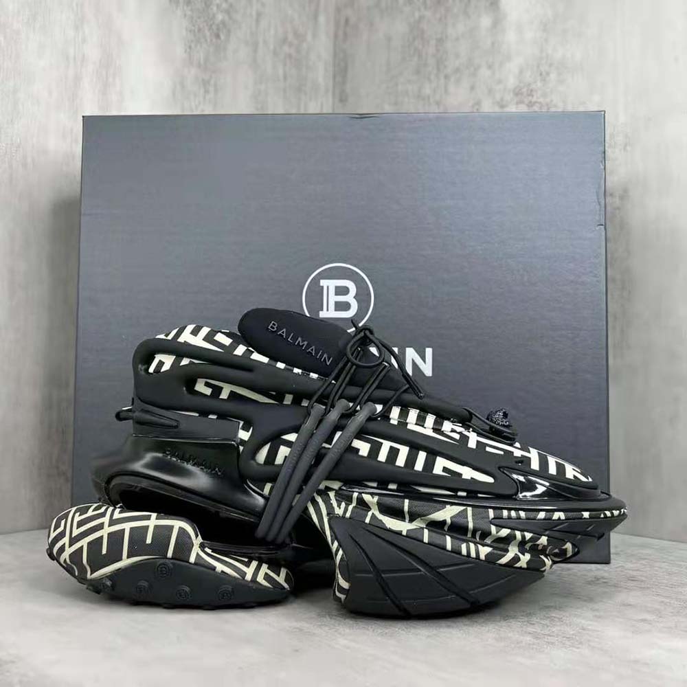 Close-up on black calfskin and neoprene texture of Balmain Unicorn sneakers