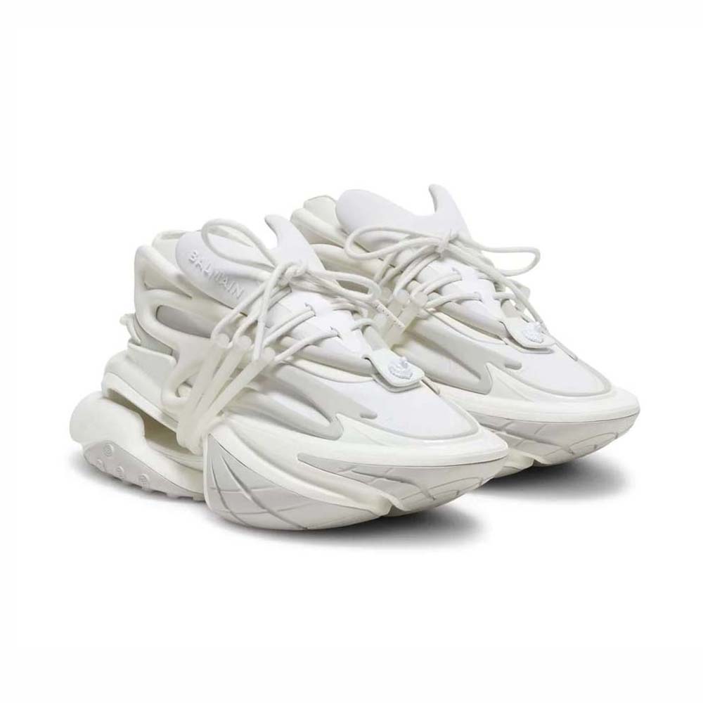 Close-up on white leather and neoprene panels on Balmain Unicorn Trainers