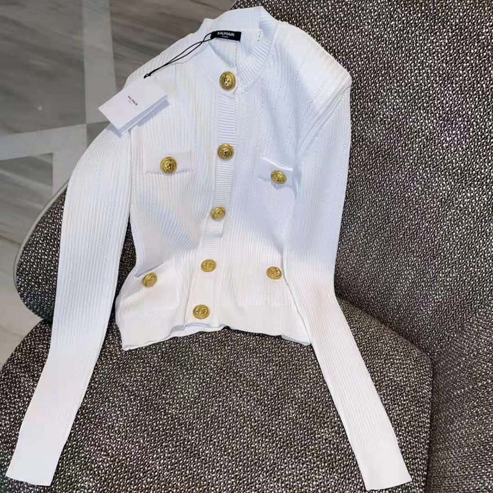 Side angle showing slim fit of Balmain Women Knit Cardigan in white