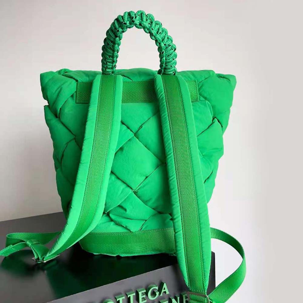 Side view showing padded leather and adjustable straps backpack