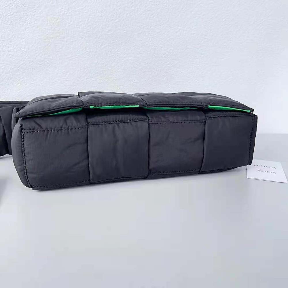 Side angle showing padded nylon and adjustable strap on Bottega Veneta bag
