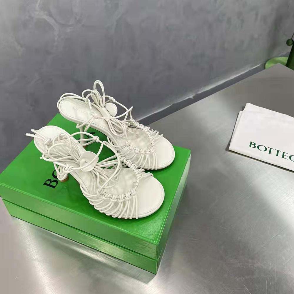Top view showing white leather ankle strap of Bottega Veneta sandals
