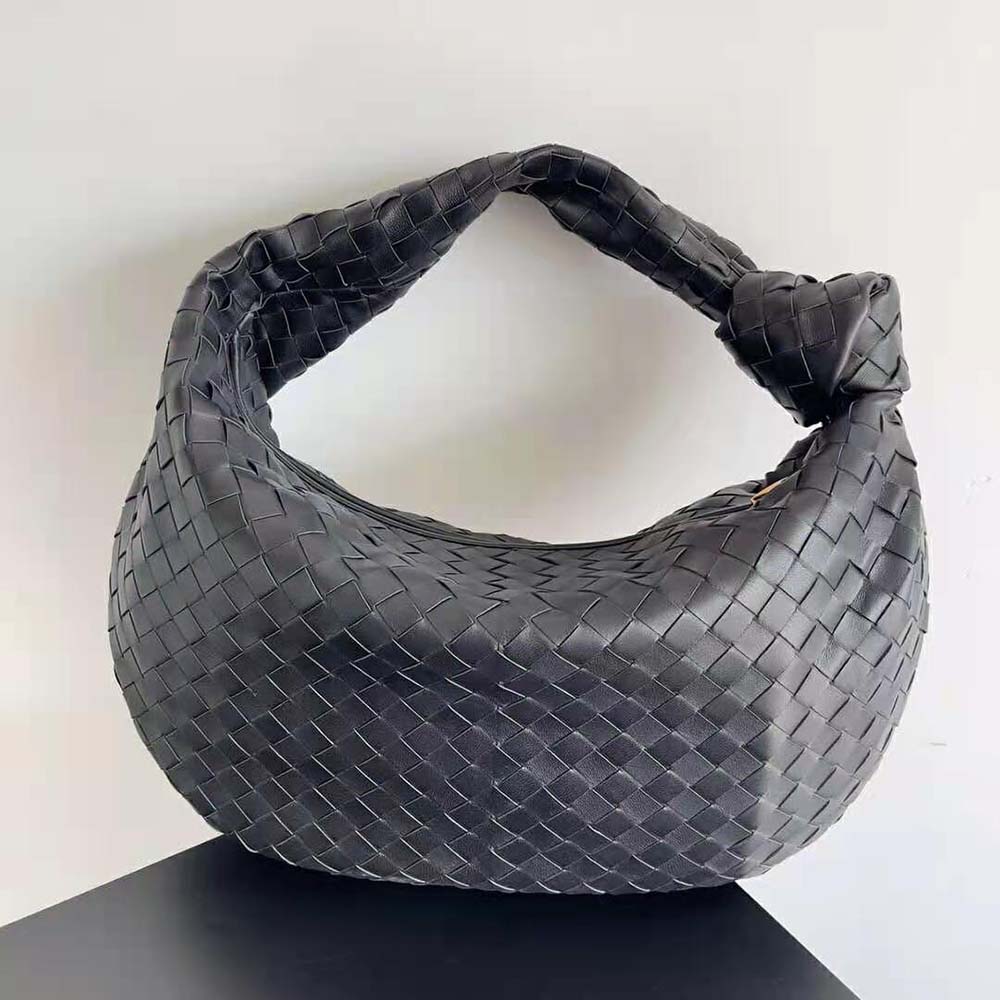 Side angle showing gold-tone hardware on Bottega Veneta Small Jodie shoulder bag