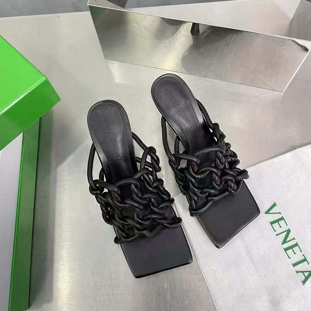 Back view showcasing heel height of Bottega Veneta black tubular leather mule
