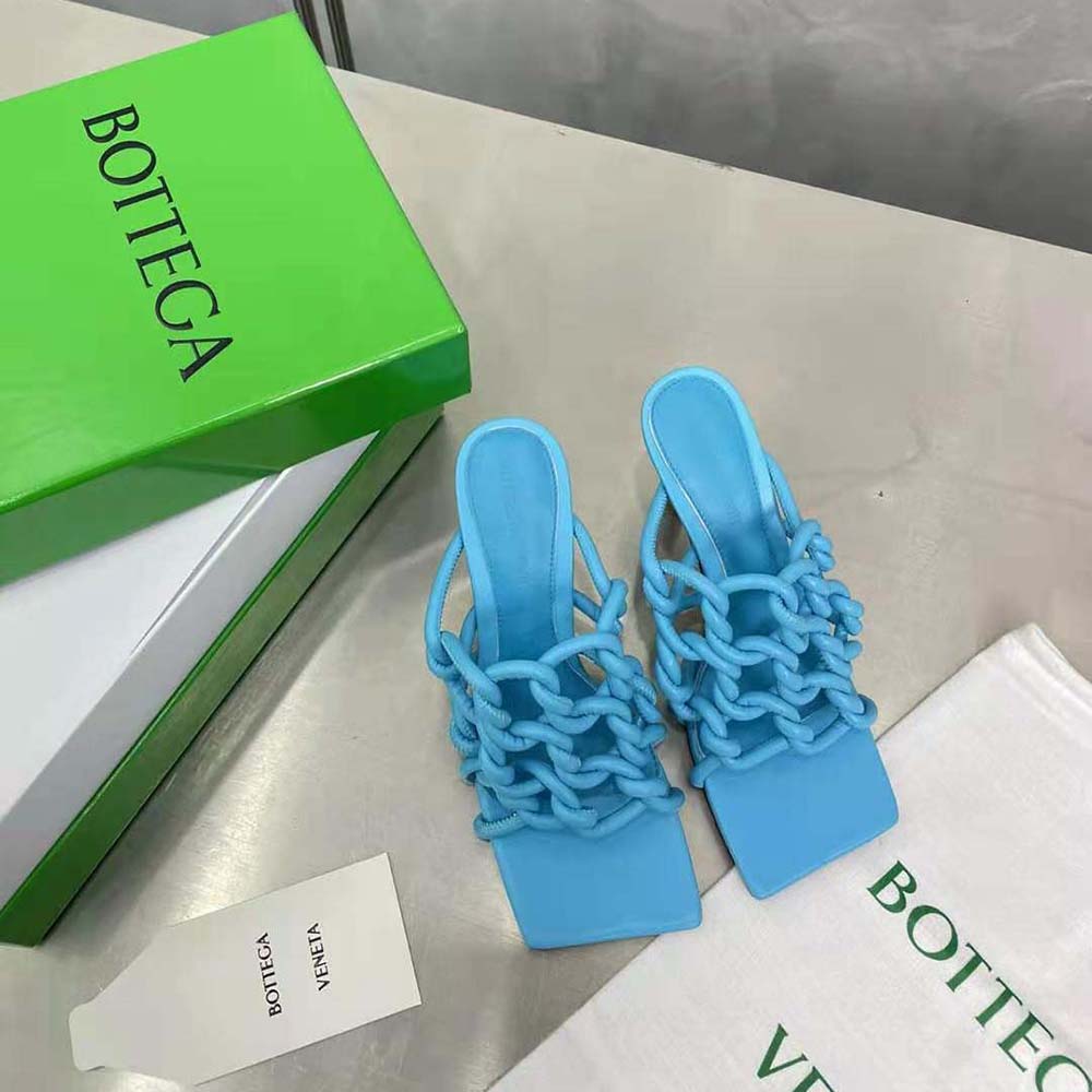 Back angle showing heel and stretch fit on Bottega Veneta mule blue