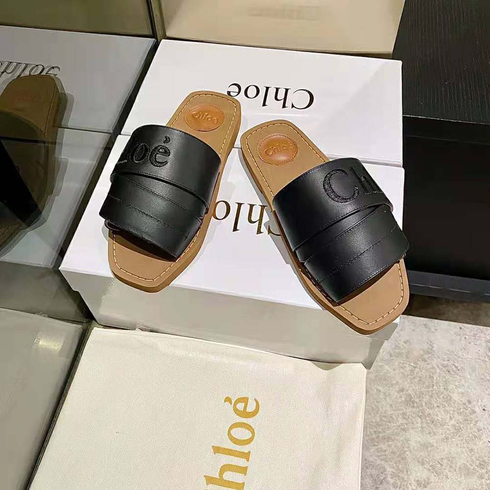 Top angle of Chloe Women Woody Flat Mule-Black highlighting slip-on design