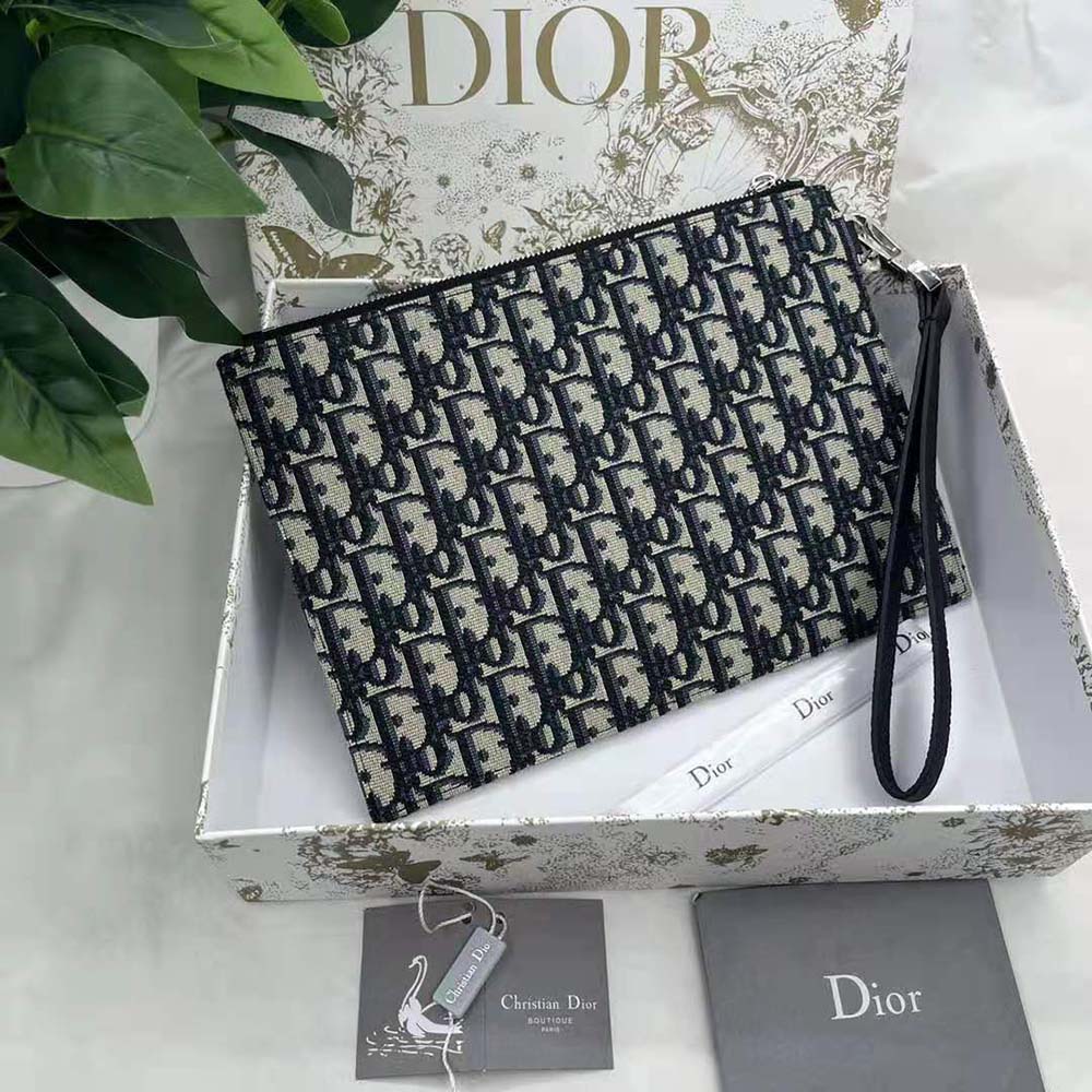 Side angle showing the slim profile of Dior Men A5 Pouch