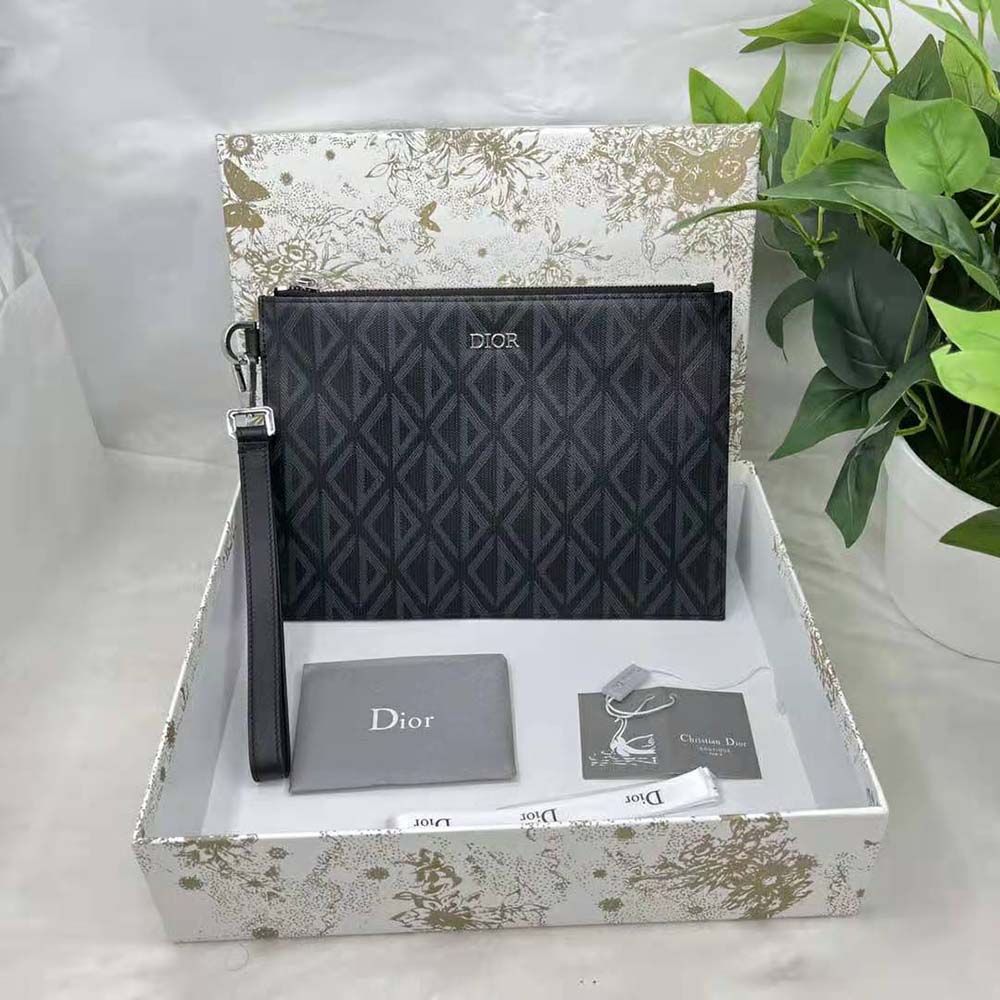 Close-up of silver-tone CD hardware on Dior Men A5 Pouch Black CD Diamond Canvas
